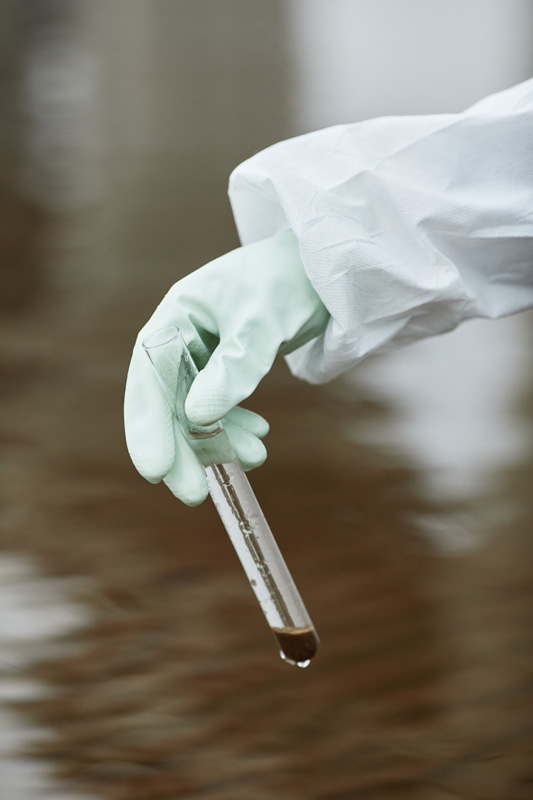 scientist taking water sample close up 2026 03 20 00 12 43 utc